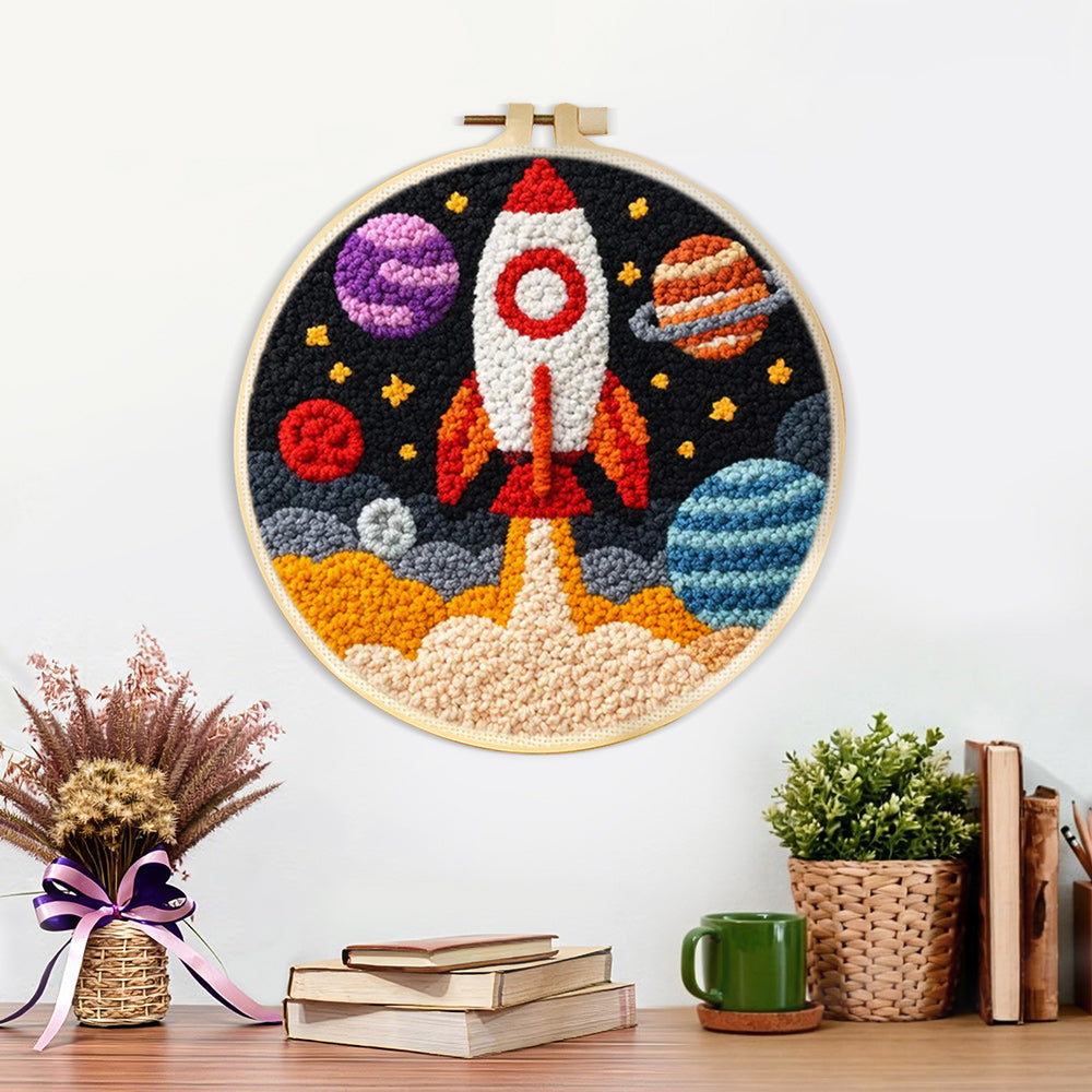 Finished galactic rocket and planets artwork displayed on a wall