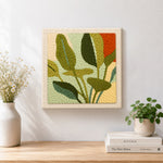 Finished giant botanical leaves artwork displayed on a wall