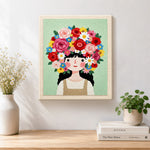 Finished giant floral crown girl artwork displayed on a wall