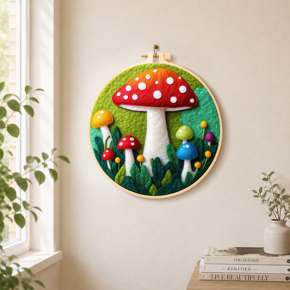 Giant red mushroom in leaves needle felt wall art displayed in a bright home interior