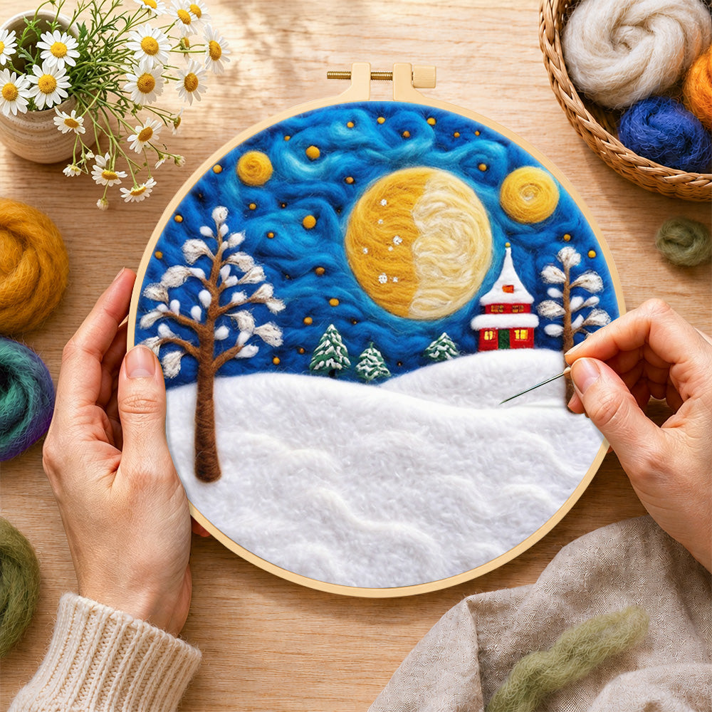Creating the giant spiral half-moon and snowy tower house wool painting by hand with a felting needle