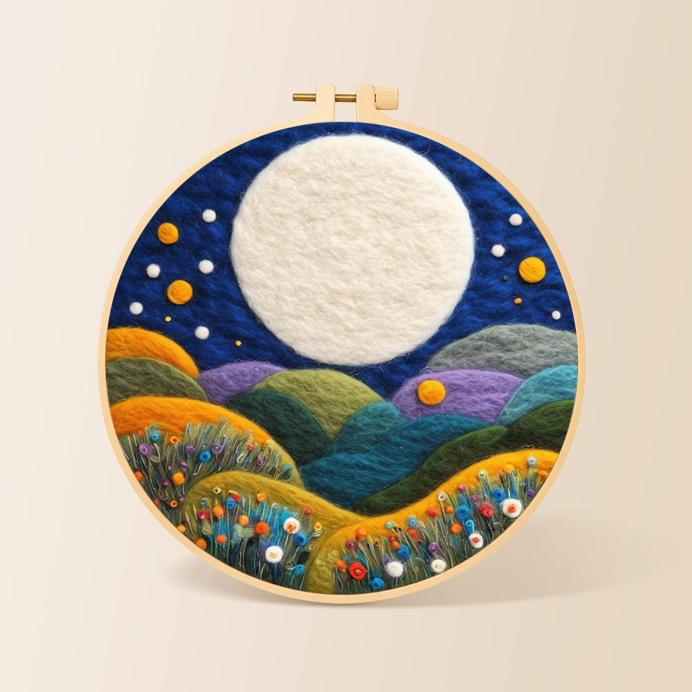 Giant white moon over colourful flower hills needle felting kit for beginners with a round wooden frame