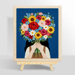 Girl holding giant flower bunch punch needle kit for beginners