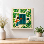 Finished girl, teal door and monstera leaves artwork displayed on a wall