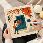 Creating handmade girl with orange leaves at blue door punch needle artwork