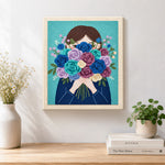 Finished girl with romantic flower bunch artwork displayed on a wall
