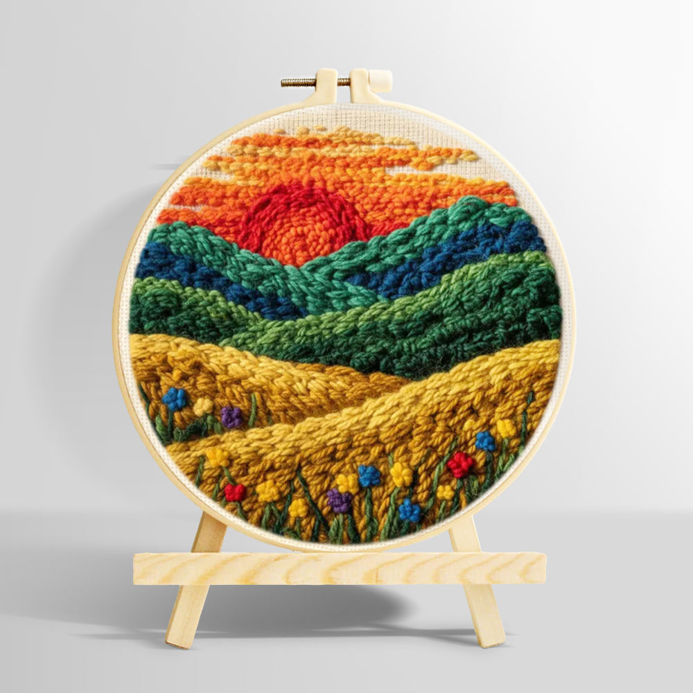 Golden field and green hills at sunset punch needle kit for beginners