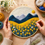 Creating the golden flower field and snowy peaks wool painting by hand with a felting needle