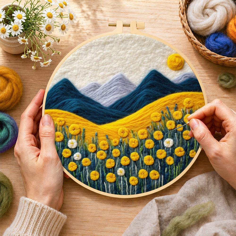 Creating the golden flower field and snowy peaks wool painting by hand with a felting needle