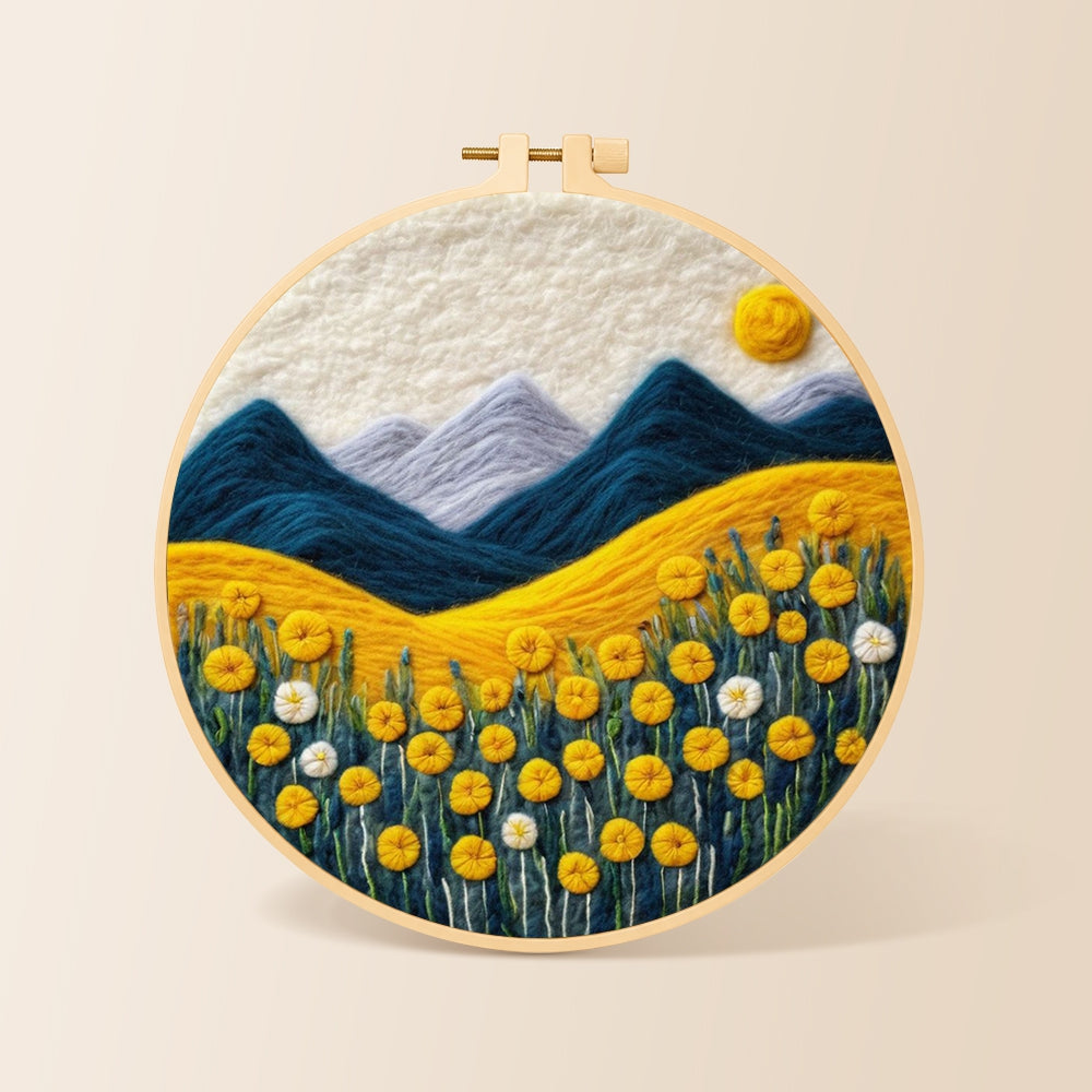 Golden flower field and snowy peaks needle felting kit for beginners with a round wooden frame