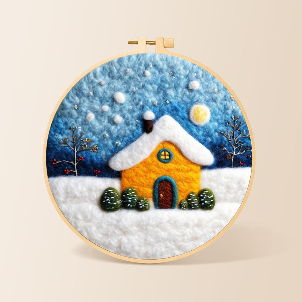 Golden snowy house under starry sky needle felting kit for beginners with a round wooden frame