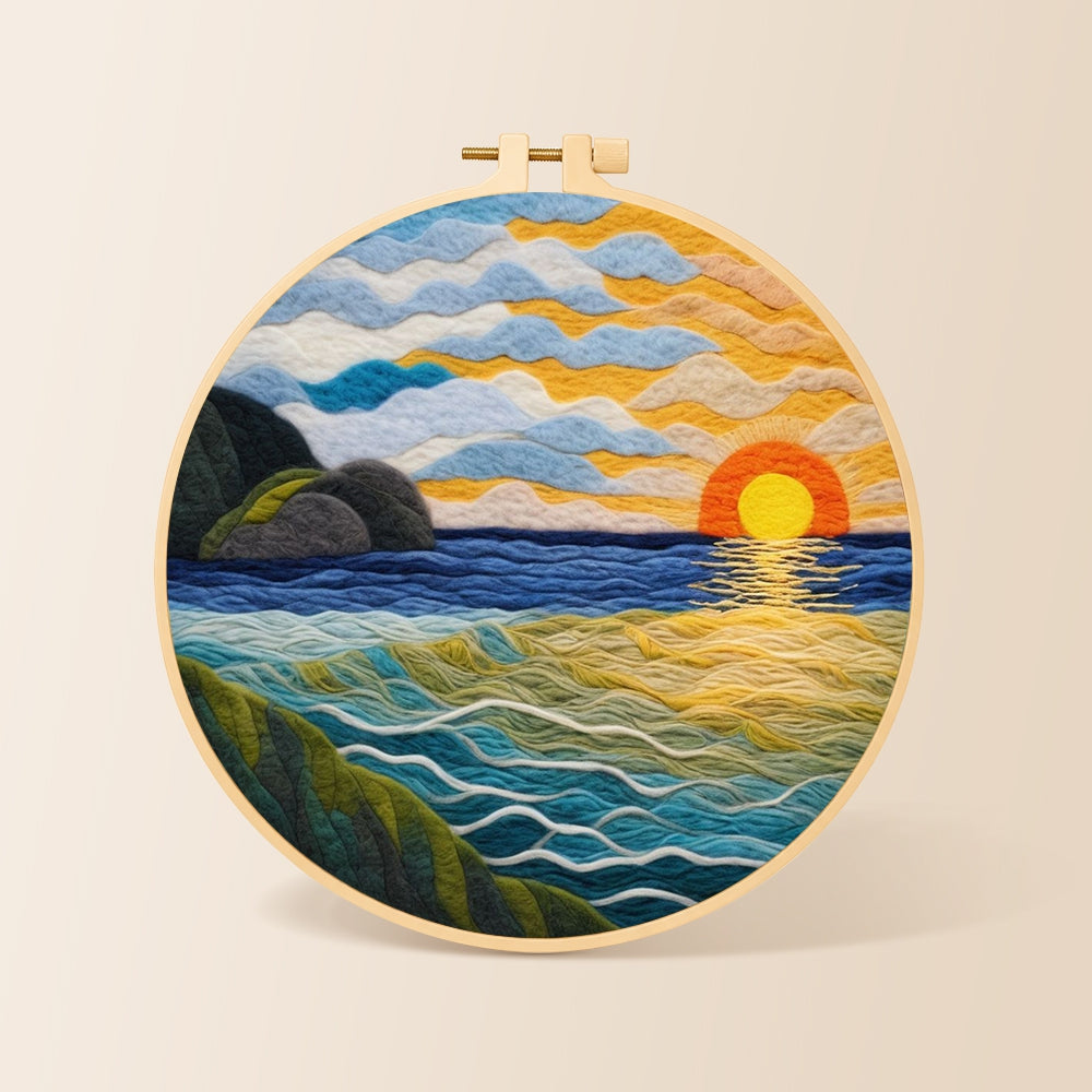 Golden sunset and textured rolling waves needle felting kit for beginners with a round wooden frame