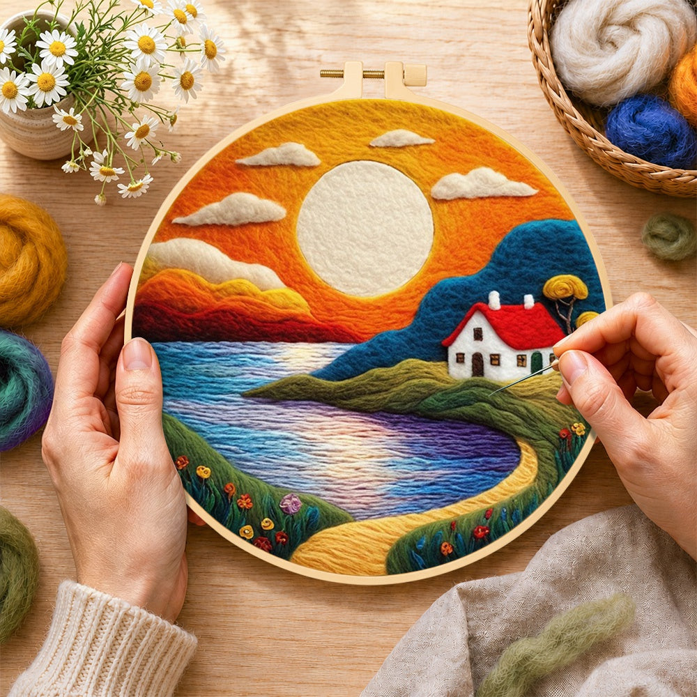 Creating the golden sunset and tranquil lake wool painting by hand with a felting needle