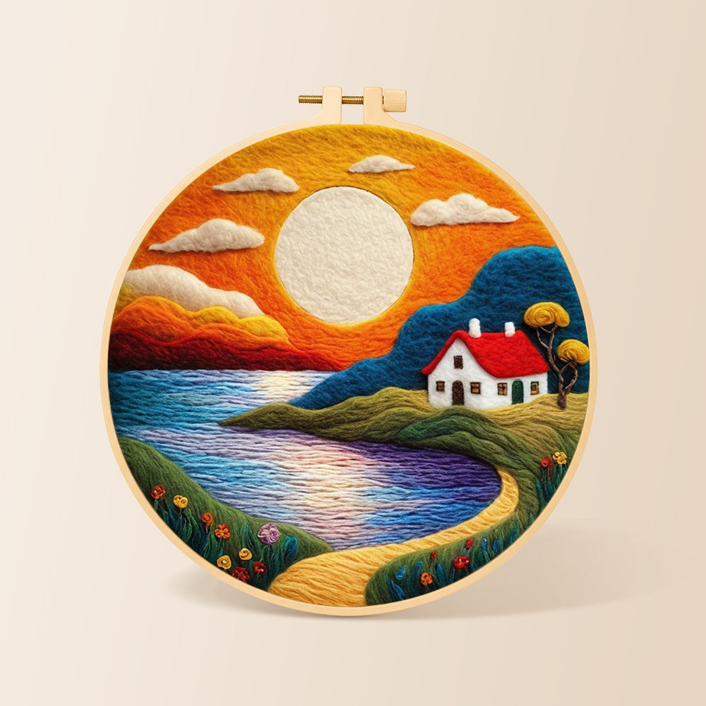 Golden sunset and tranquil lake needle felting kit for beginners with a round wooden frame