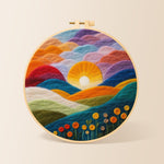 Gradient clouds, bright yellow sunset and colourful hills needle felting kit for beginners with a round wooden frame