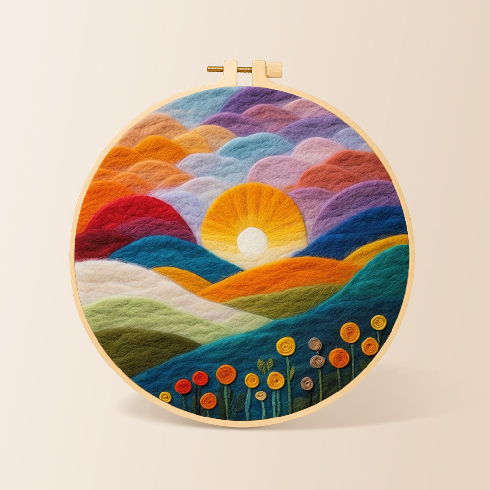 Gradient clouds, bright yellow sunset and colourful hills needle felting kit for beginners with a round wooden frame