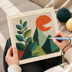 Creating handmade green leaves and mountains punch needle artwork