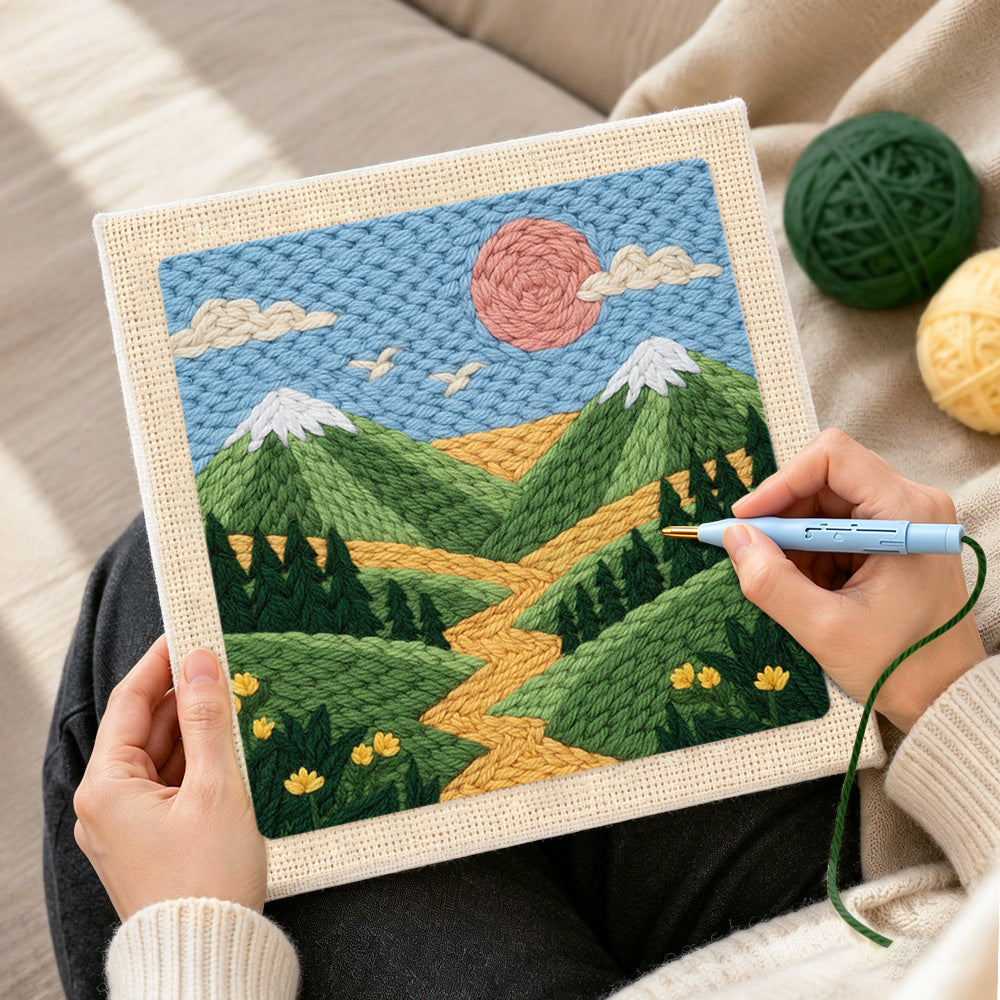 Creating handmade green mountains and yellow wildflowers punch needle artwork