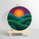 Green rolling hills at sunset punch needle kit for beginners
