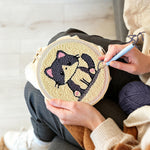 Creating handmade grey kitten punch needle artwork