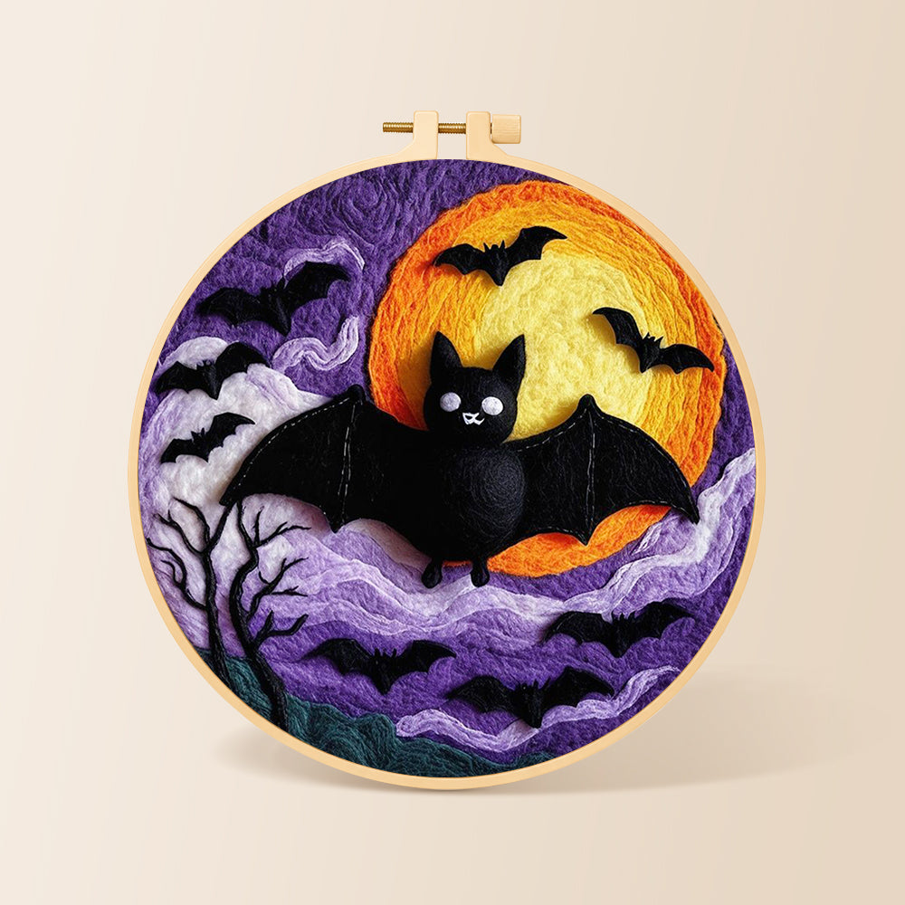 Halloween bats and spooky swirling clouds needle felting kit for beginners with a round wooden frame