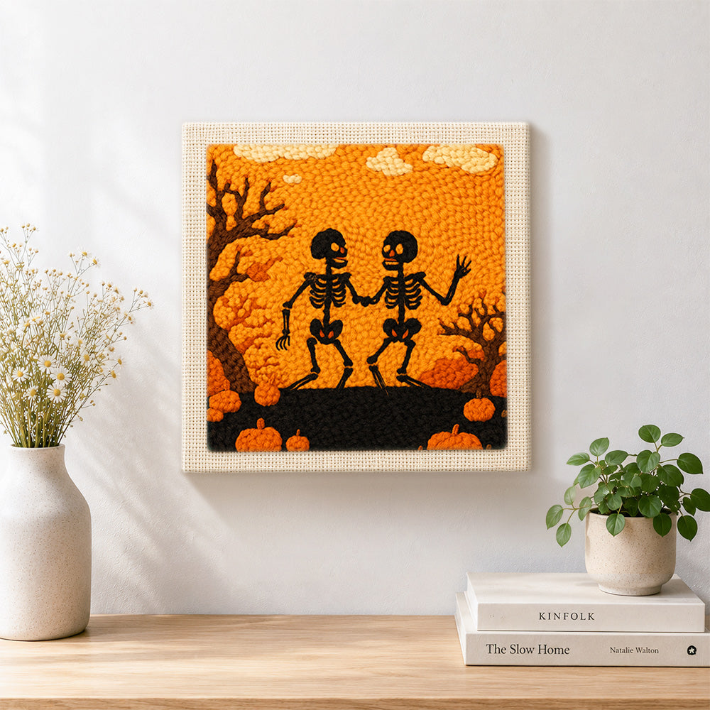 Finished halloween dancing skeletons artwork displayed on a wall