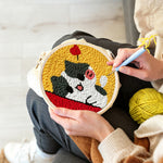 Creating handmade happy and adorable cat punch needle artwork