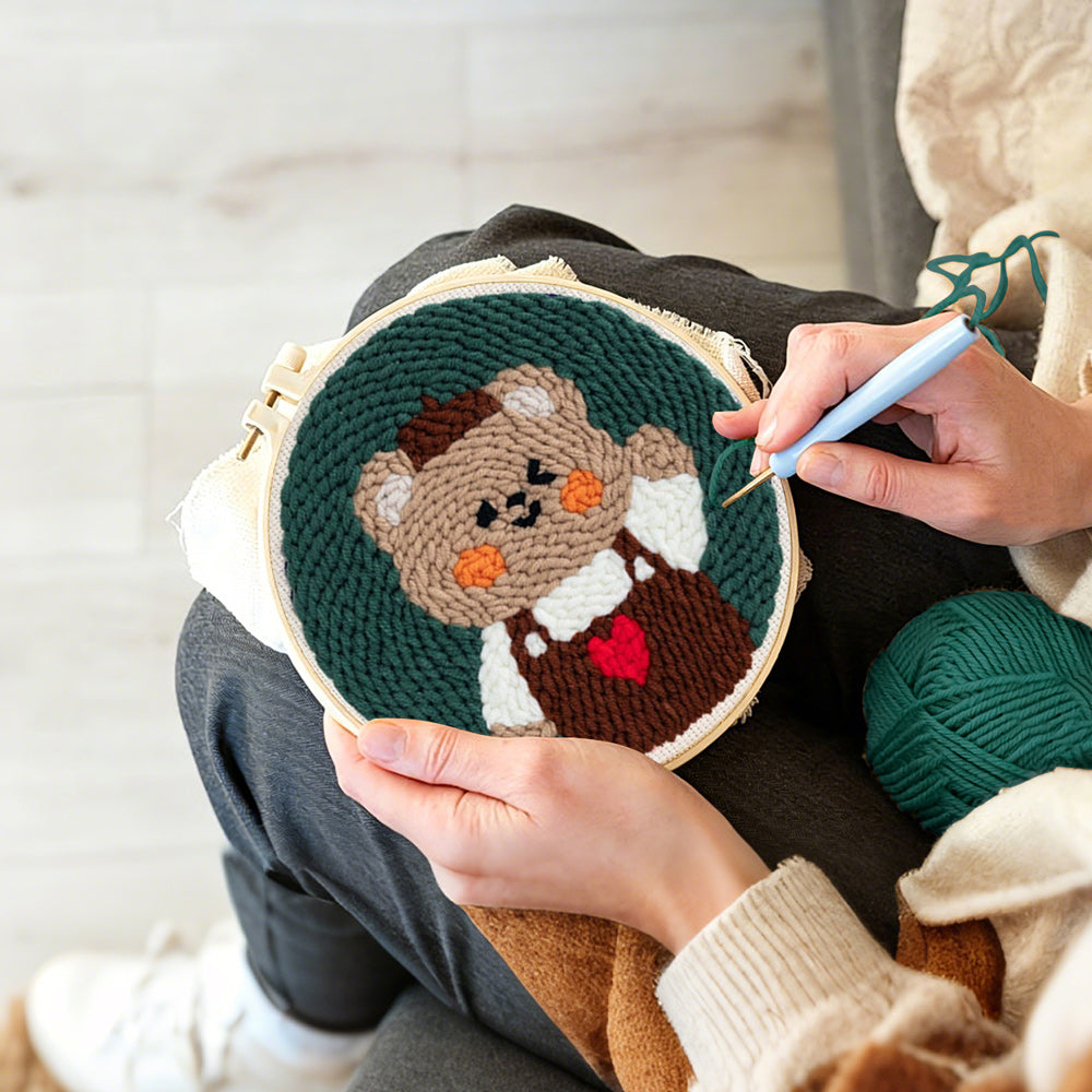 Creating handmade happy bear punch needle artwork