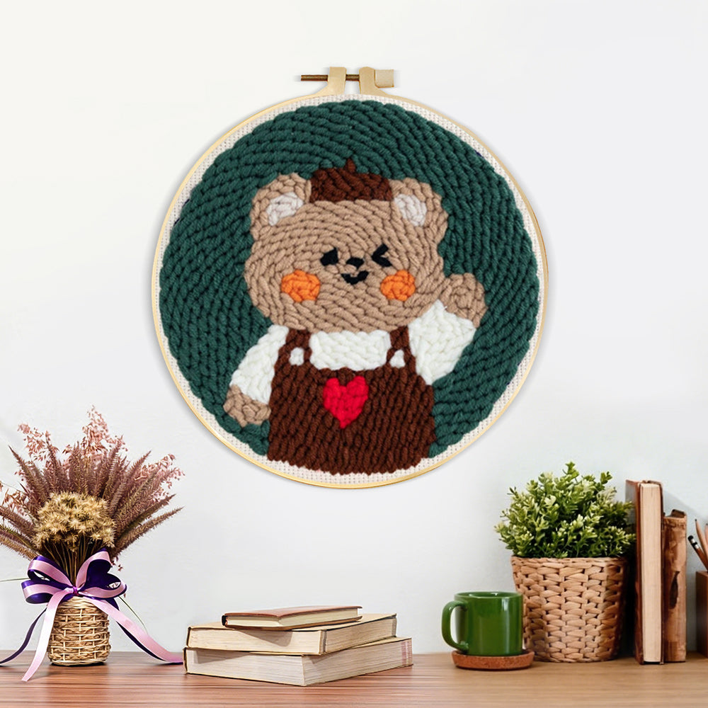 Finished happy bear artwork displayed on a wall