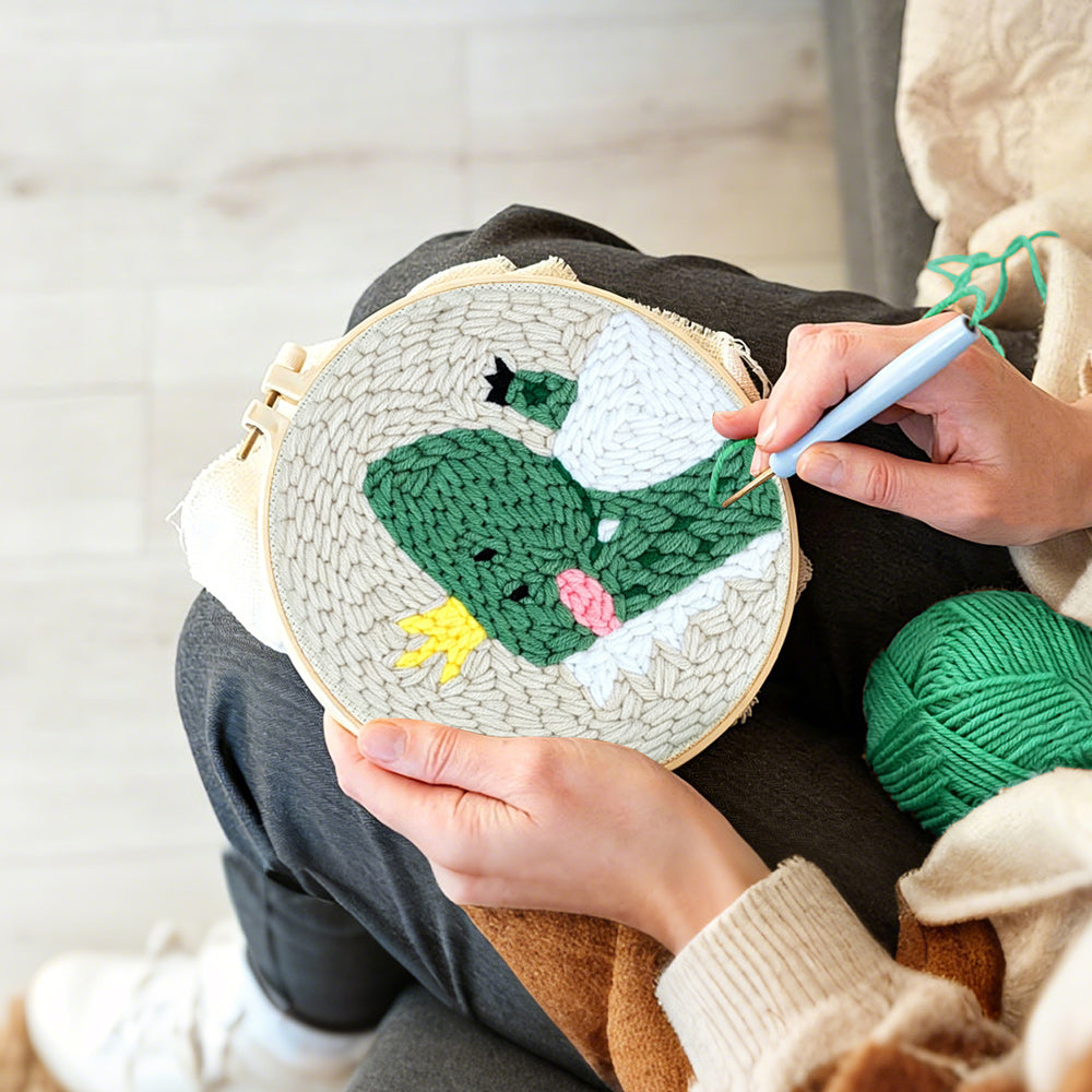 Creating handmade happy crown dinosaur punch needle artwork