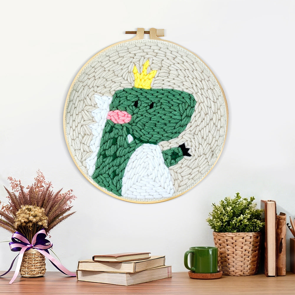 Finished happy crown dinosaur artwork displayed on a wall