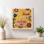 Finished happy diwali floral artwork displayed on a wall
