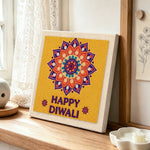 Happy diwali mandala punch needle artwork displayed on a table