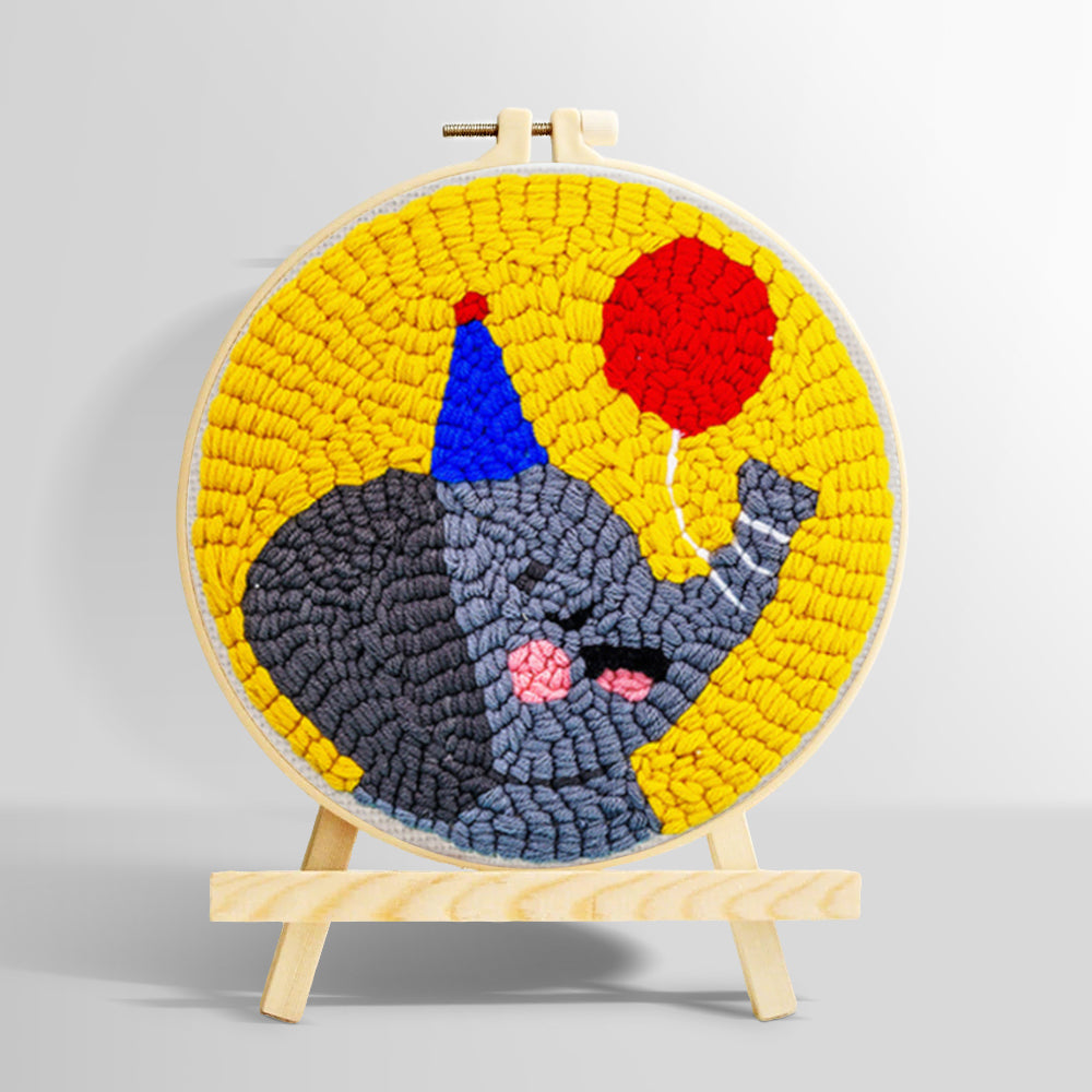 Happy elephant with a red balloon punch needle kit for beginners