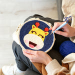 Creating handmade happy giraffe punch needle artwork