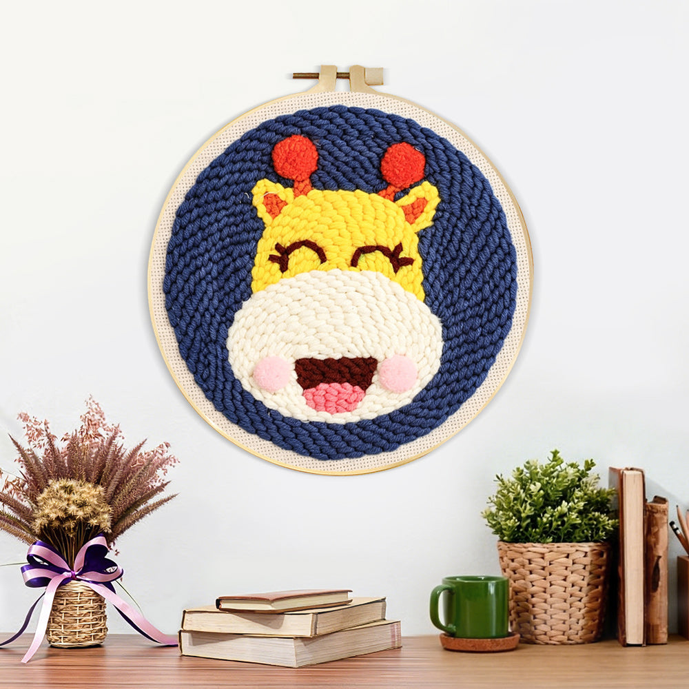 Finished happy giraffe artwork displayed on a wall