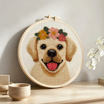 Happy labrador punch needle artwork displayed on a table