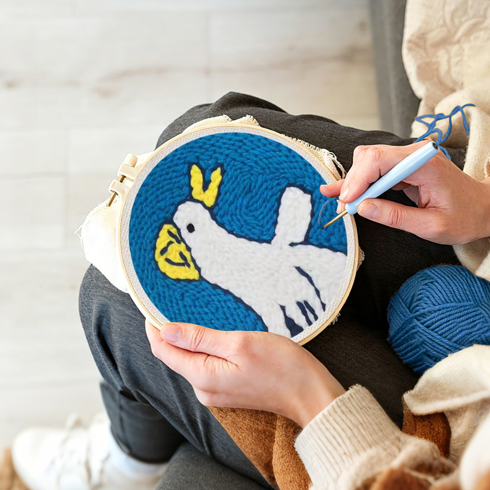Creating handmade happy little duck punch needle artwork