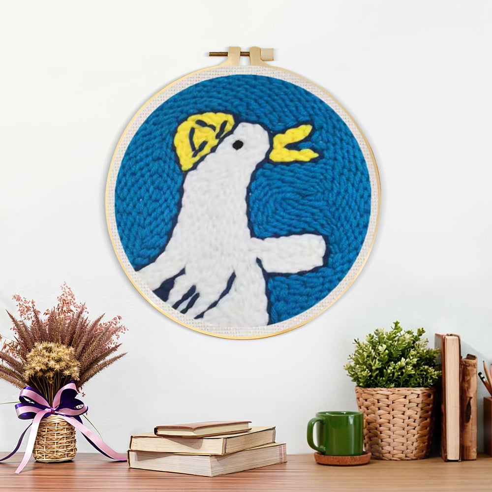 Finished happy little duck artwork displayed on a wall