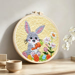 Happy rabbit harvest punch needle artwork displayed on a table