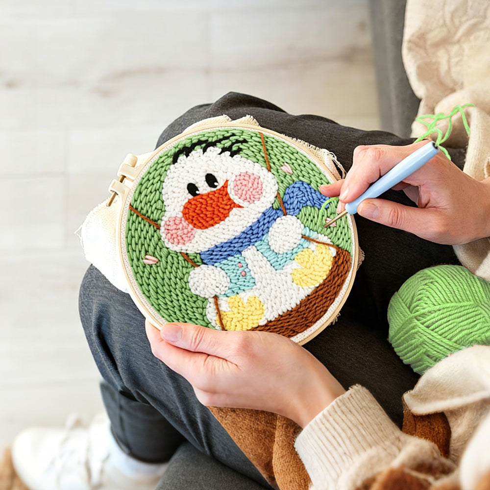 Creating handmade happy swing duck punch needle artwork