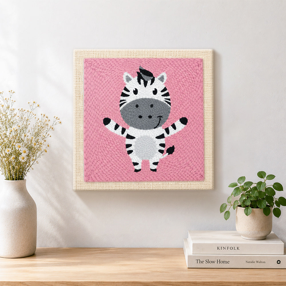 Finished happy zebra with open arms artwork displayed on a wall