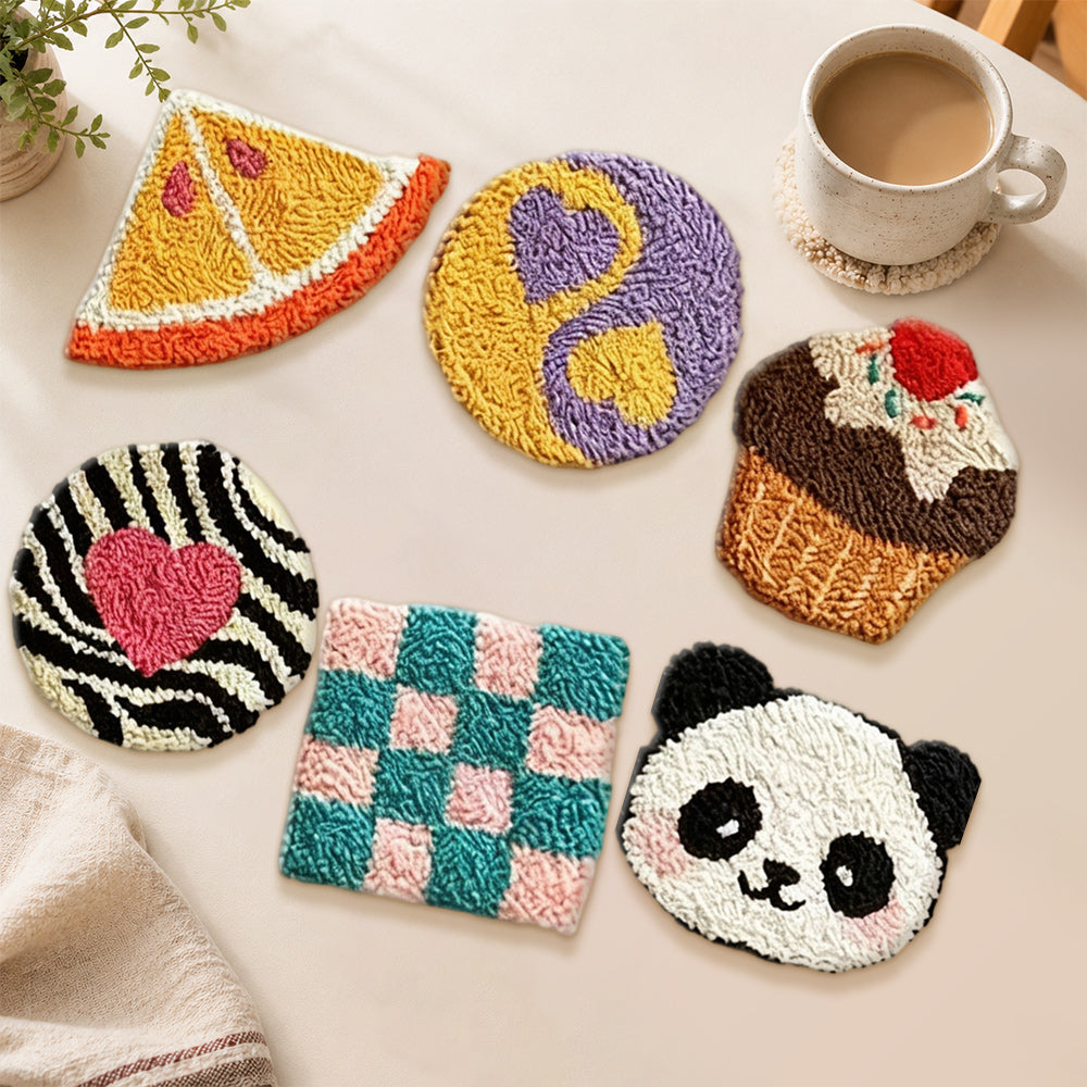 Heart, panda and cupcake punch needle coasters used for home decoration