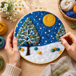 Creating the heart-shaped christmas tree in the snow wool painting by hand with a felting needle