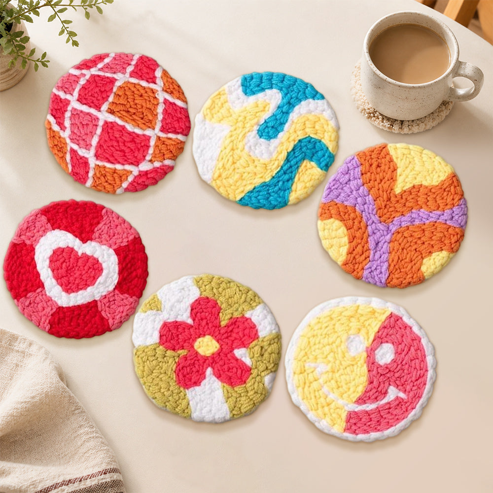 Heart, swirl and smiley punch needle coasters used for home decoration