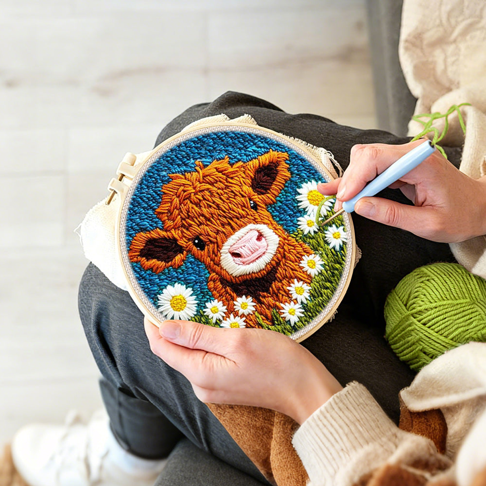 Creating handmade highland cow and white daisies punch needle artwork