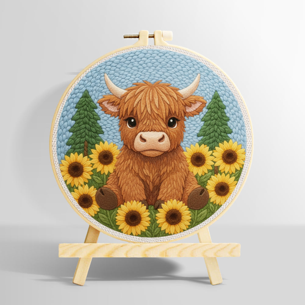 Highland cow surrounded by sunflowers punch needle kit for beginners