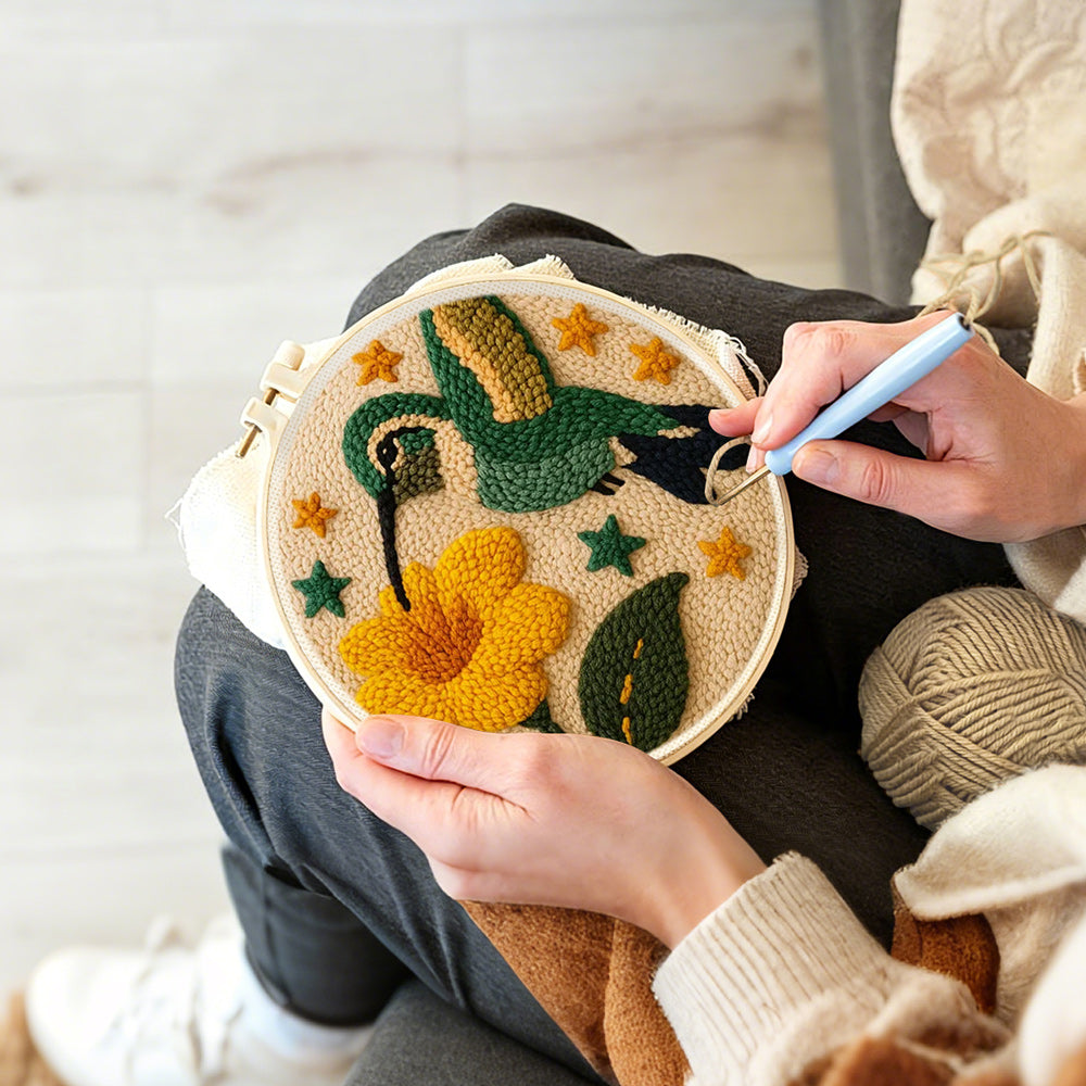 Creating handmade hummingbird and flower punch needle artwork
