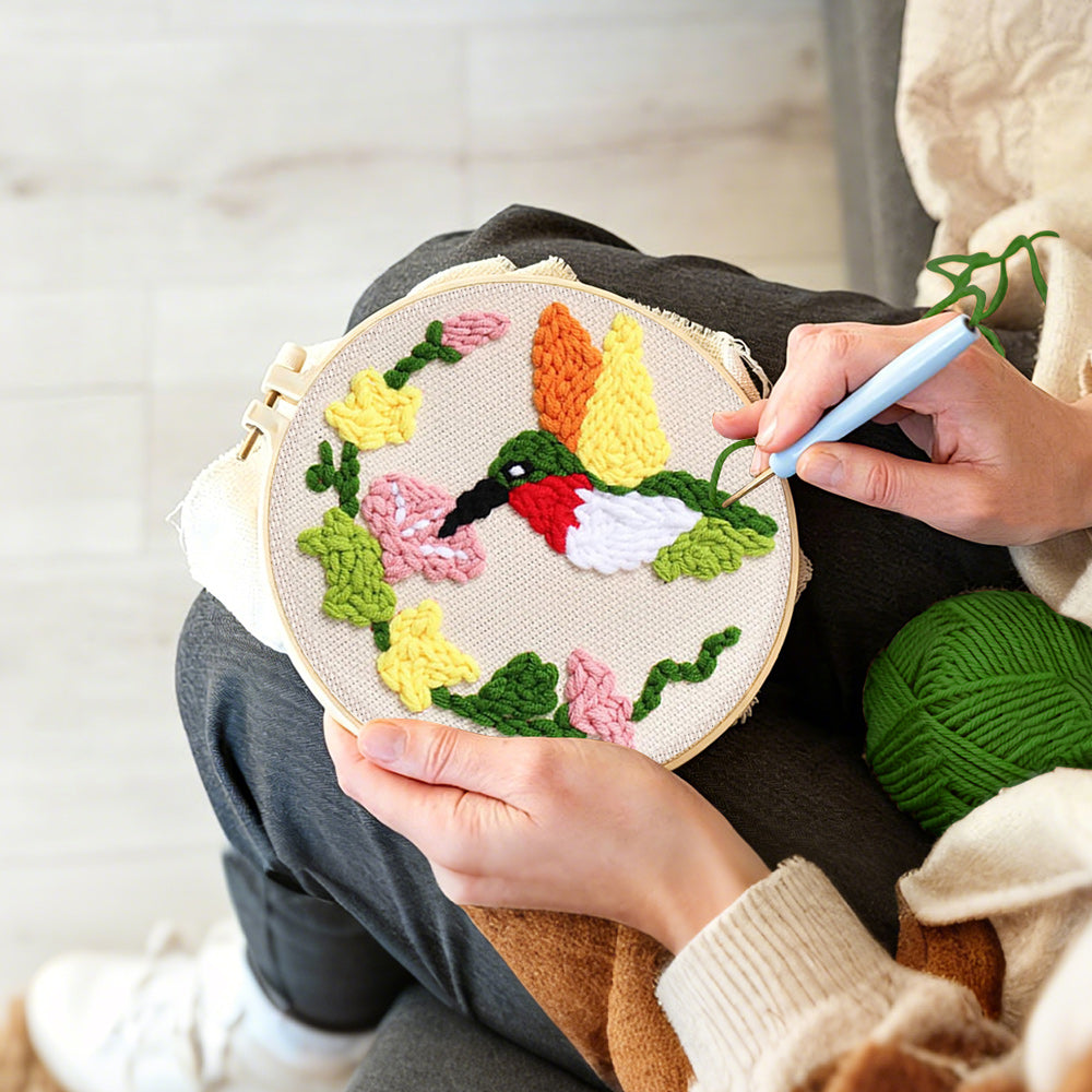 Creating handmade hummingbird and flowers punch needle artwork
