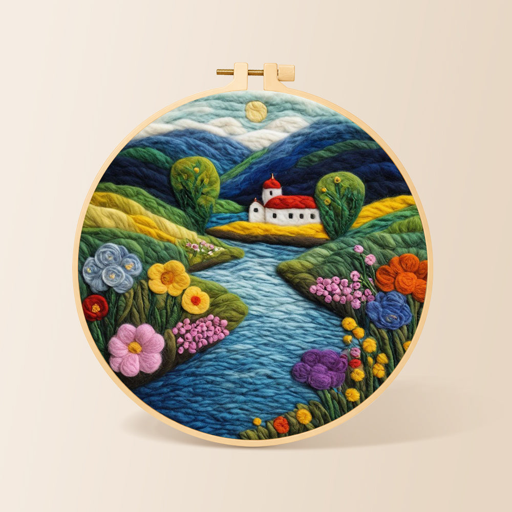 Idyllic mountain village and river needle felting kit for beginners with a round wooden frame
